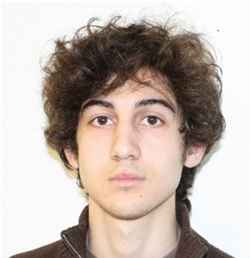 Dzhokhar Tsarnaev, acusado, ao lado do irmão, Tamerlan, pelos atentados de 15 de abril em Boston, escreveu um bilhete, antes de ser capturado, afirmando que o ataque era um 