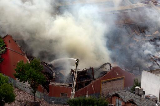 Vista aérea do galpão que pegou fogo e desabou em Barracas, sul de Buenos Aires, em 5 de fevereiro de 2014. Foto: AFP/Nicolas Garcia